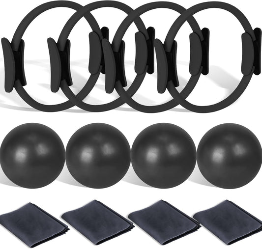 Four black Pilates rings, four mini balls, and four flat resistance bands arranged as a 12-piece set