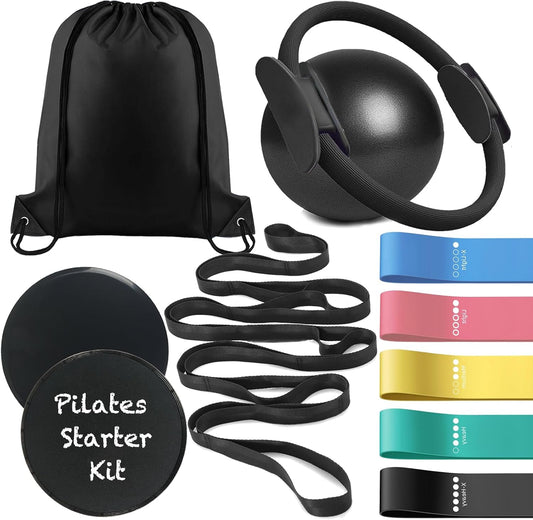 Black home Pilates kit with ring, mini ball, core sliders, resistance bands, stretch strap, and drawstring bag